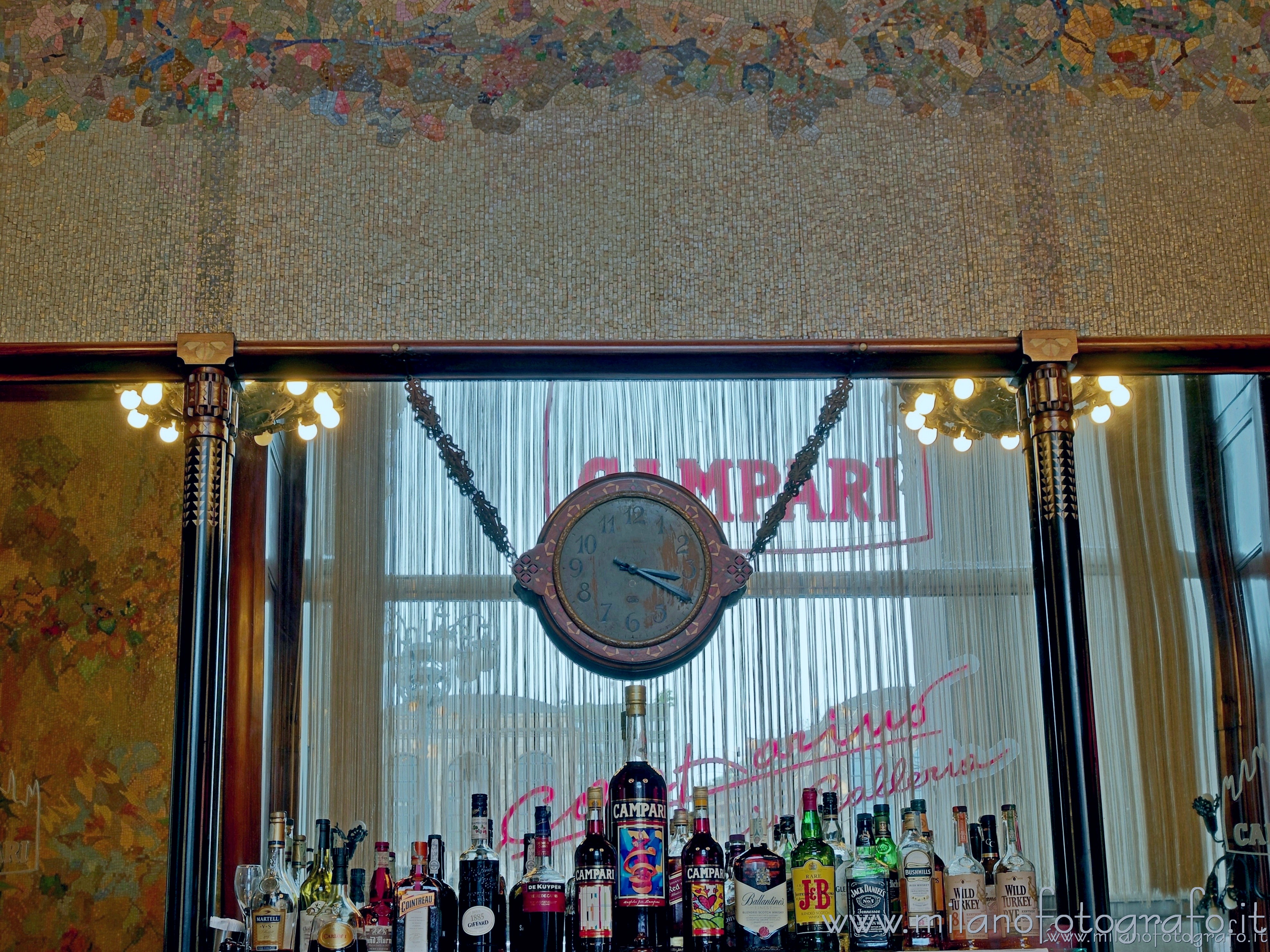 Milan (Italy) - Art nouveau mosaics  and clock in the Camparino Bar